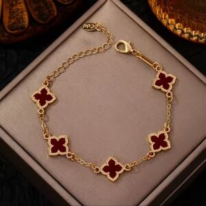 Gold-Tone Bracelet with Red Clover Motifs